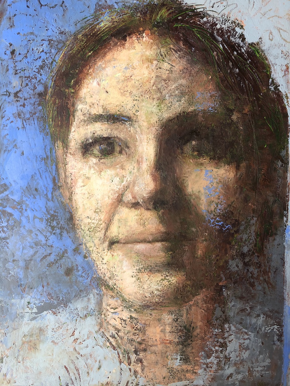 The class self-portrait with warm skin colours and blue textured layers